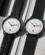 popup|Neues Editionsarmband Bauhaus|Das Editionsband Bauhaus - hergestellt in Deutschland - besticht durch sein markantes Bauhaus Muster auf der Oberseite des schwarzen Kalbleders.