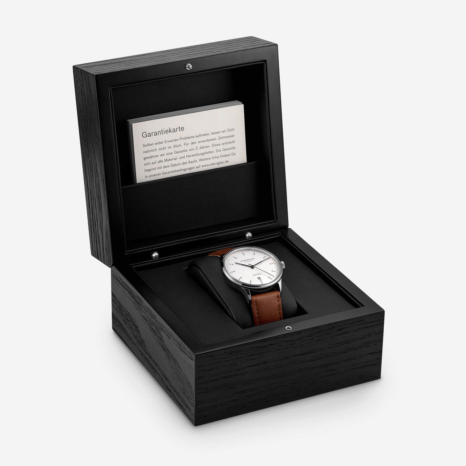 popup|Hochwertige Uhrenbox|Die Kanton 2.0 kommt in einer edlen Aufbewahrungsbox mit schwarzem Eichenfurnierholz.