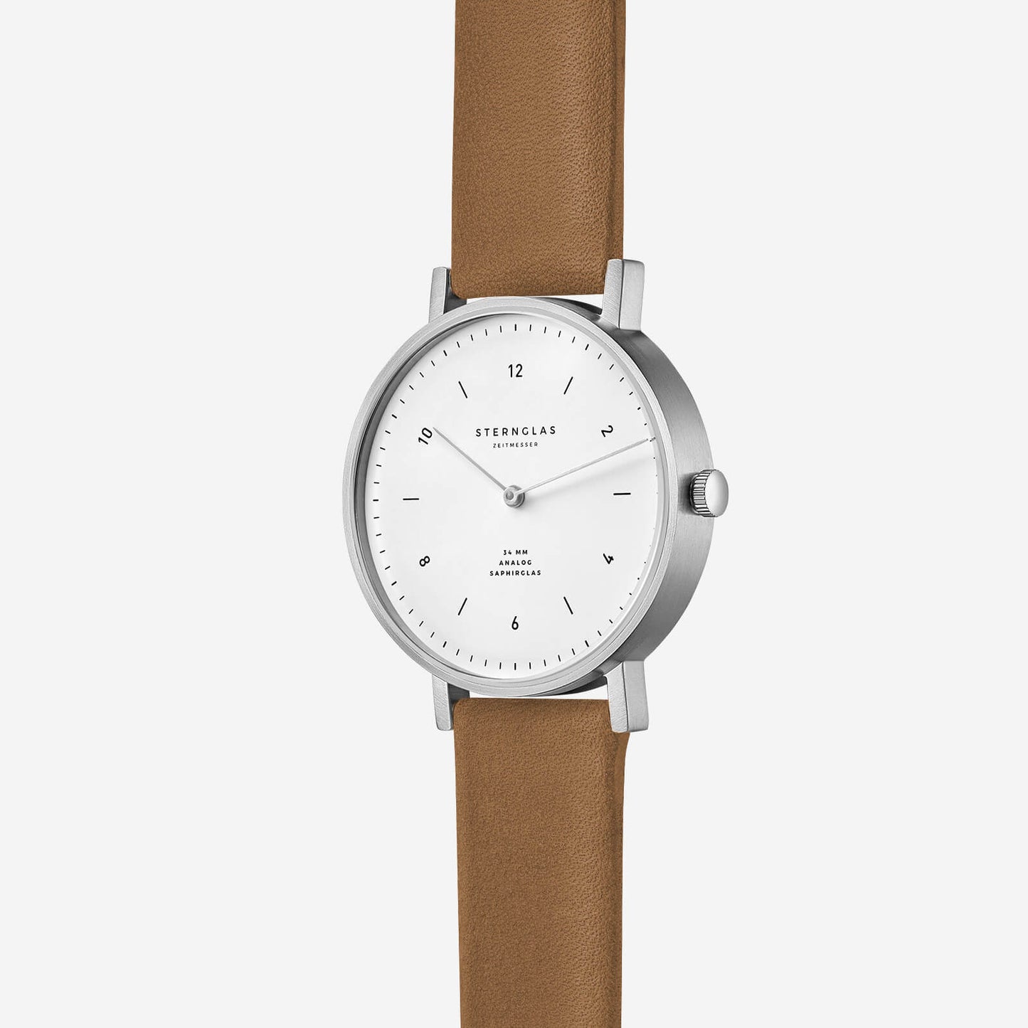 popup|Klassisches Zifferblatt|Die Minuten- und Stundenindizes sind in harmonischen  Ringen angeordnet und führen so den Blick über das  Zifferblatt hin zu den feinen, metallischen Zeigern. 