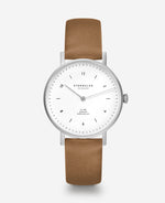 popup|Raffiniert einfach|Mit einem Durchmesser von 34 mm ist sie das  zierliche Pendant zur Junis 38 und damit perfekt  abgestimmt auf das weibliche Handgelenk